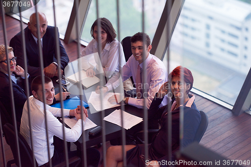 Image of business people group on meeting at modern bright office