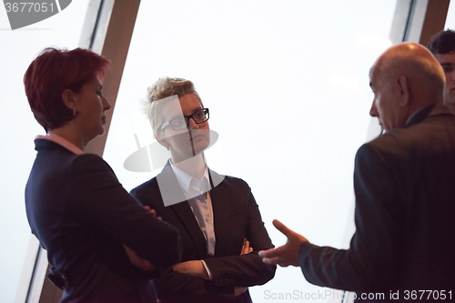 Image of business people group on meeting at modern bright office