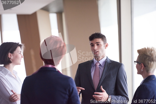 Image of business people group on meeting at modern bright office
