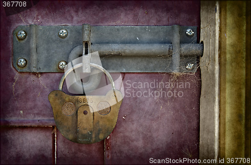 Image of old locked door