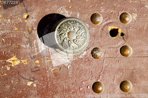 Image of rusty     morocco in africa the old  home and safe padlock 