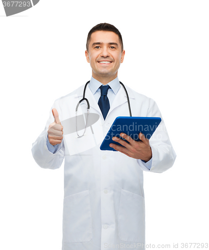 Image of smiling male doctor in white coat with tablet pc