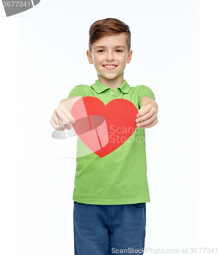 Image of happy boy holding red heart shape