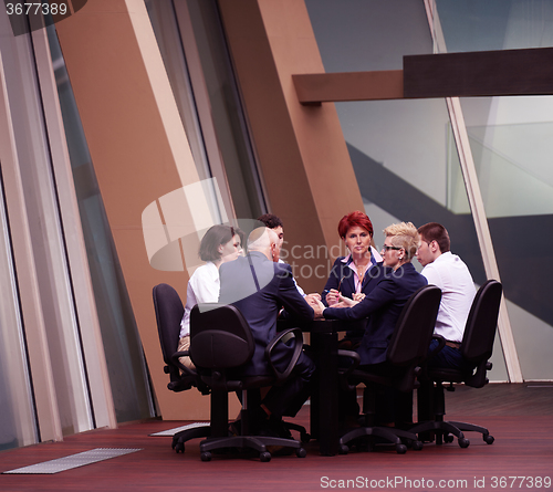 Image of business people group on meeting at modern bright office