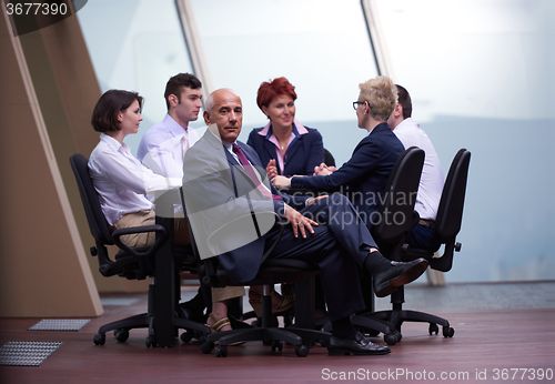 Image of business people group on meeting at modern bright office