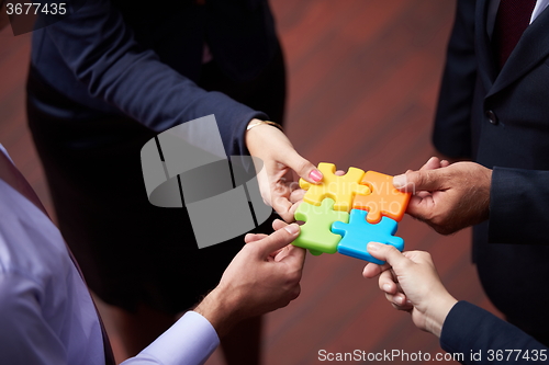 Image of assembling jigsaw puzzle