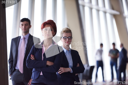 Image of diverse business people group with redhair  woman in front