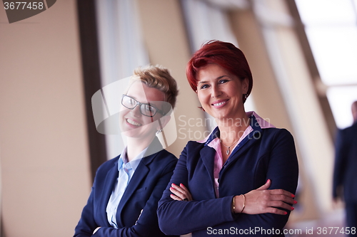 Image of business woman goup at modern bright office