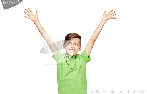 Image of happy boy in polo t-shirt raising hands up