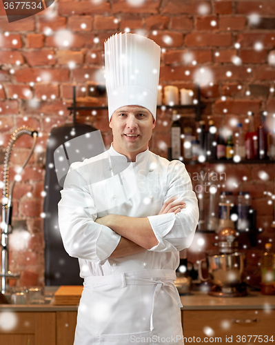 Image of happy male chef cook in restaurant kitchen