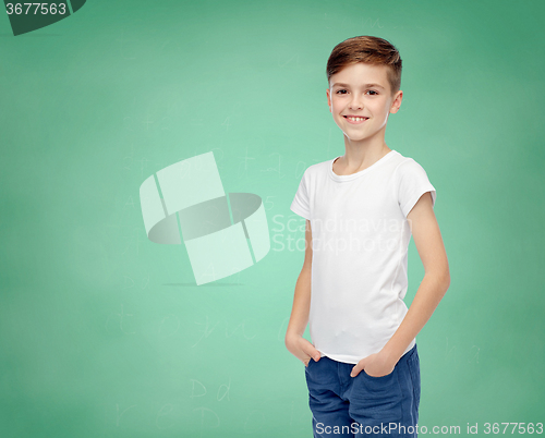 Image of happy boy in white t-shirt and jeans