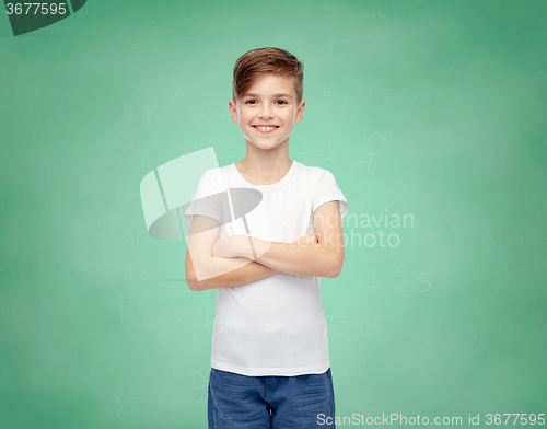 Image of happy boy in white t-shirt and jeans