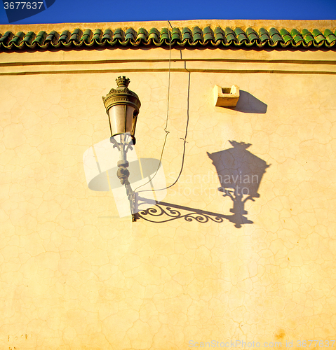 Image of street lamp old construction in africa morocco and  leather near