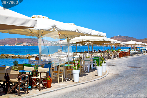 Image of table in santorini   restaurant chair and the 