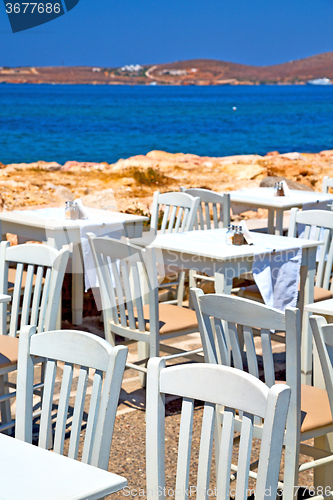 Image of table in   greece   chair and the summer