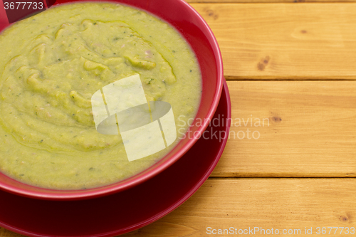 Image of Close-up of bowl of green soup on a table