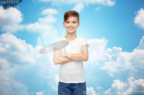 Image of happy boy in white t-shirt and jeans