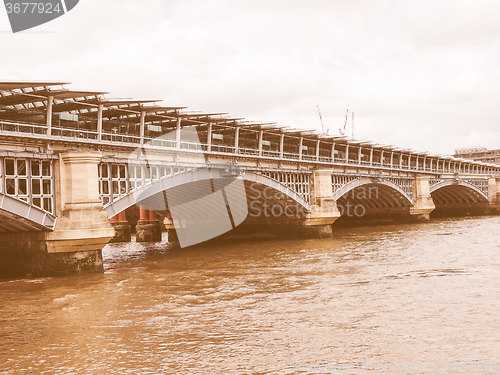 Image of Retro looking Blackfriars bridge in London