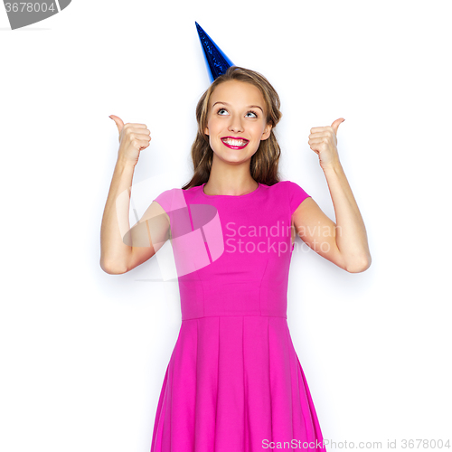 Image of happy young woman or teen girl in party cap