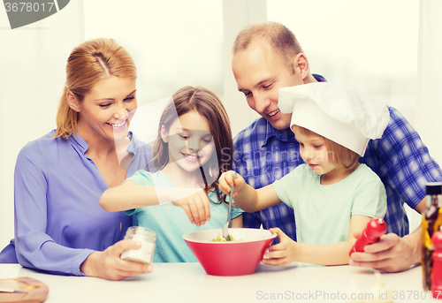 Image of happy family with two kids eating at home