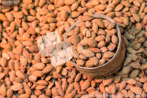 Image of Scoop of almonds.