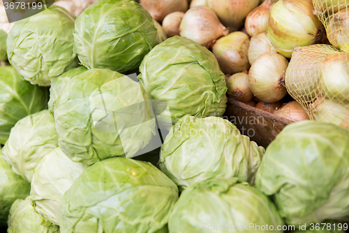 Image of close up of cabbage and onion at street market