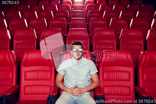 Image of young man watching movie in 3d theater