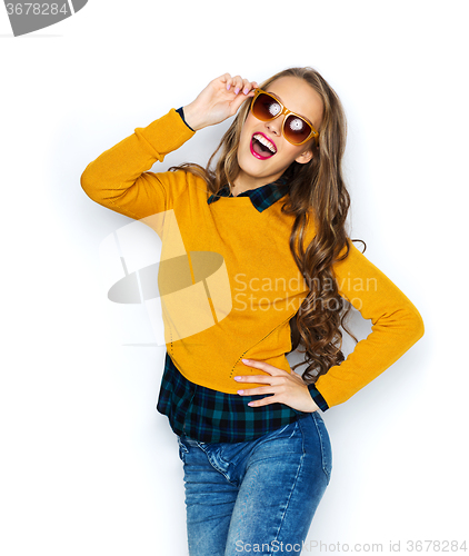 Image of happy young woman or teen girl in casual clothes