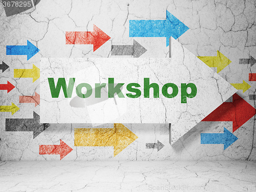 Image of Education concept: arrow with Workshop on grunge wall background