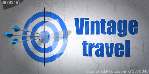 Image of Tourism concept: target and Vintage Travel on wall background