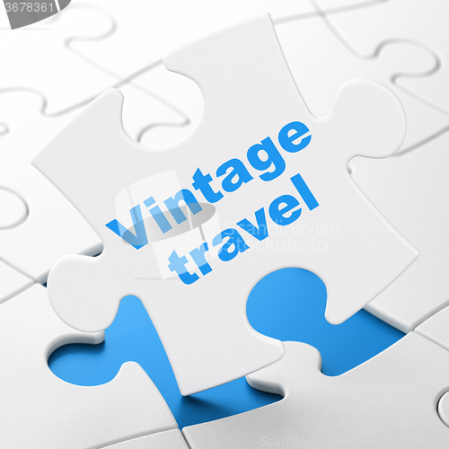 Image of Travel concept: Vintage Travel on puzzle background