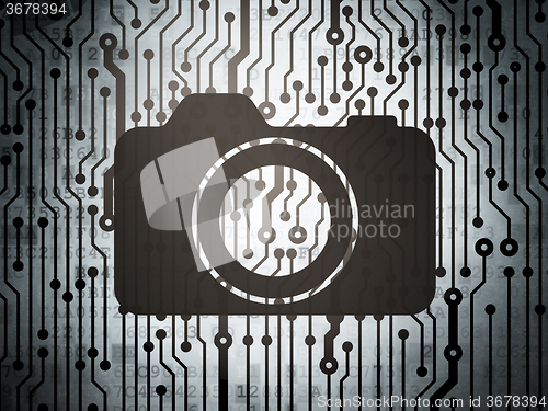 Image of Travel concept: circuit board with Photo Camera