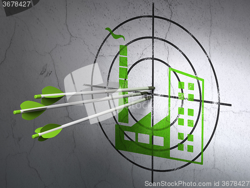 Image of Industry concept: arrows in Industry Building target on wall background