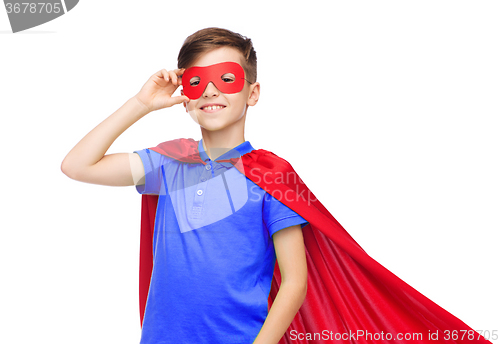 Image of boy in red super hero cape and mask