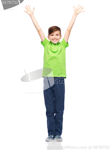 Image of happy boy in polo t-shirt raising hands up