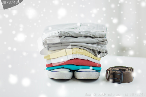 Image of close up of clothes and accessories on table