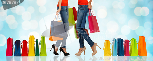 Image of close up of women with shopping bags