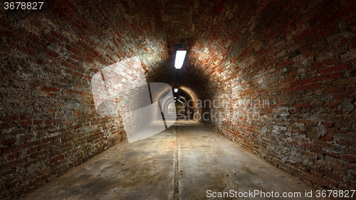 Image of Long underground brick tunnel angle shot