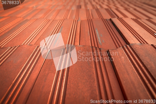 Image of Roof tile over blue sky