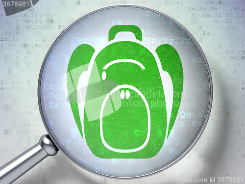 Image of Studying concept: Backpack with optical glass on digital background