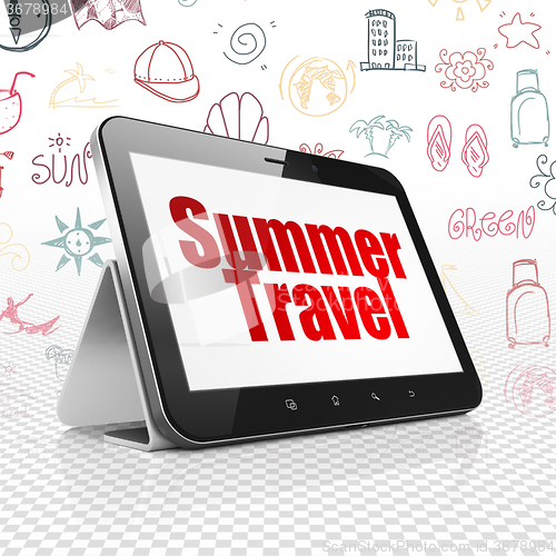 Image of Tourism concept: Tablet Computer with Summer Travel on display