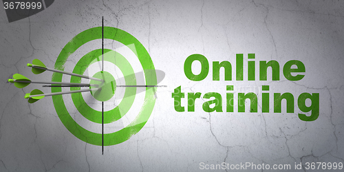 Image of Learning concept: target and Online Training on wall background