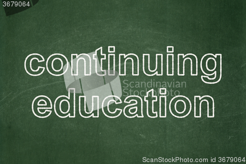 Image of Studying concept: Continuing Education on chalkboard background