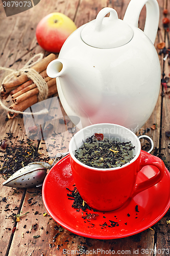 Image of White teapot and fruit