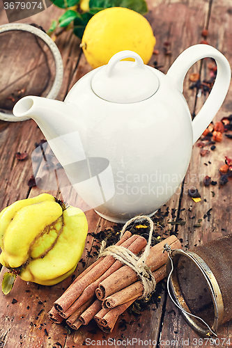 Image of White teapot and fruit