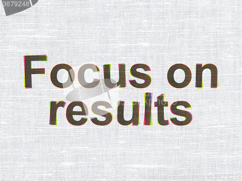 Image of Finance concept: Focus on RESULTS on fabric texture background