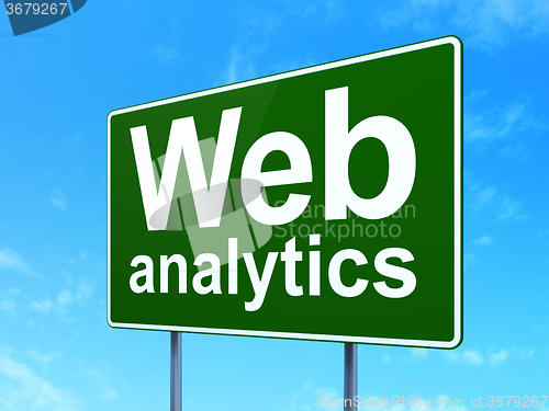 Image of Web development concept: Web Analytics on road sign background