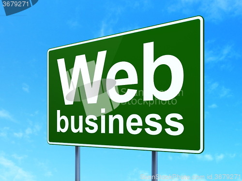 Image of Web development concept: Web Business on road sign background