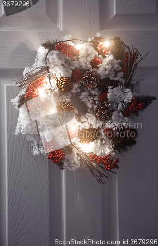 Image of Christmas wreath and light