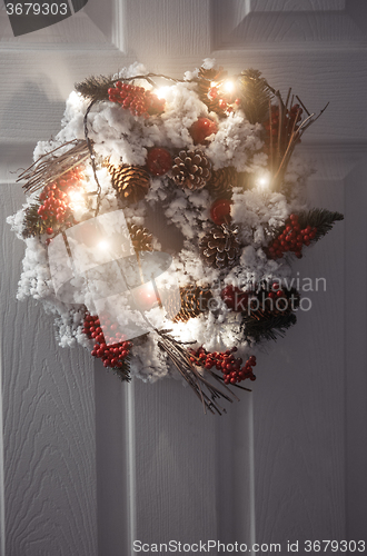 Image of Christmas wreath and light